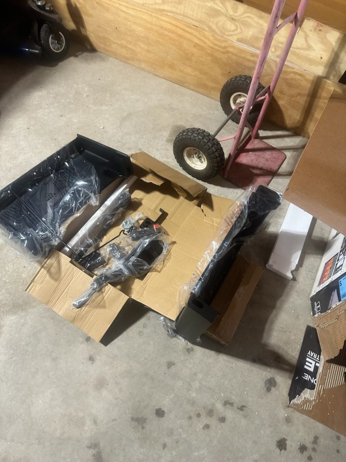 Blackstone griddle unboxed and parts laid out for assembly